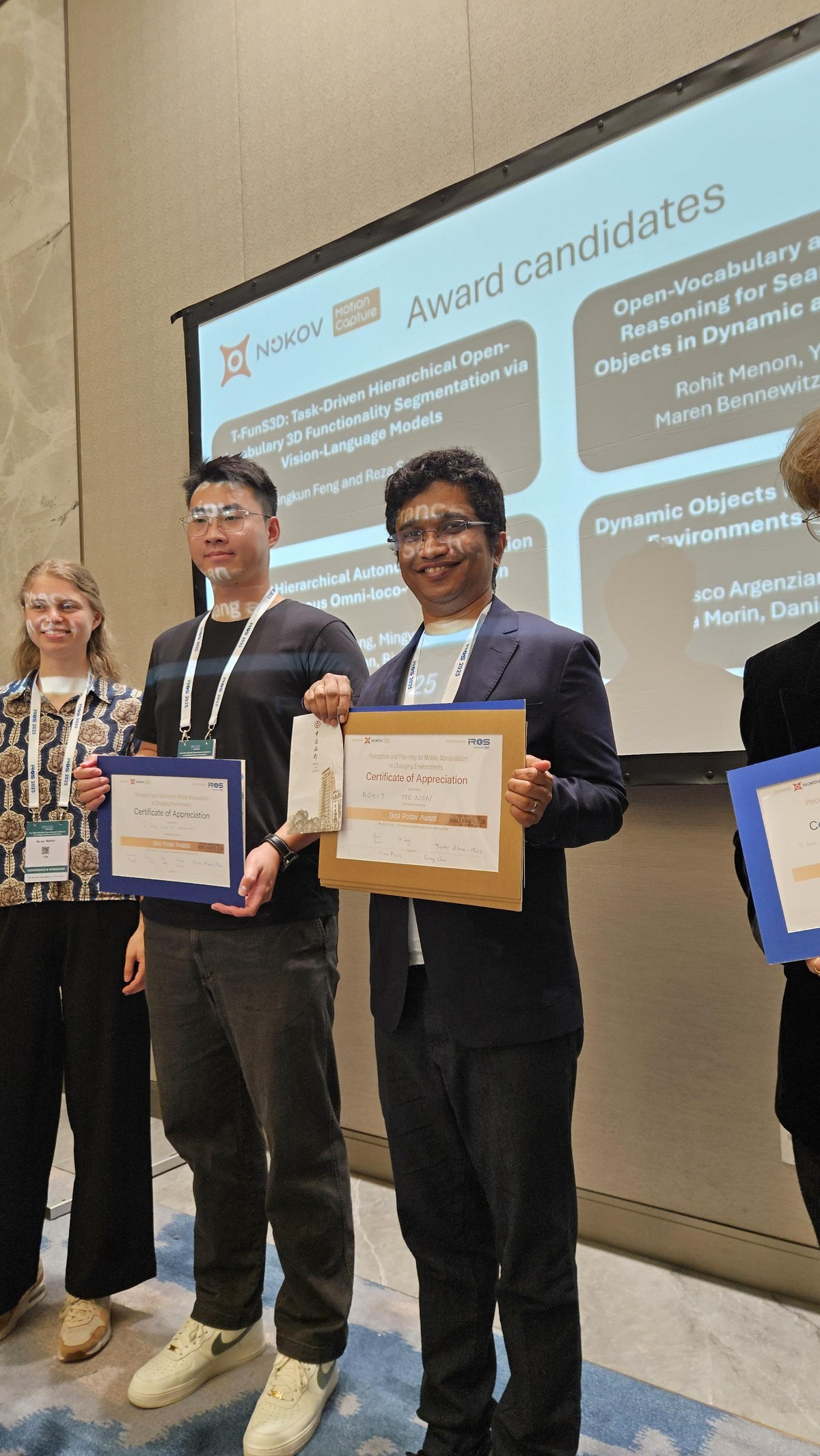 Rohit Menon receiving the IROS 2025 workshop Best Poster Award